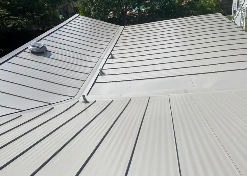 Solar attic fan installed on a metal roof for Roof Ventilation in Toppenish